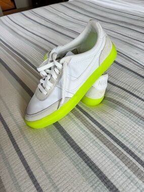 Nike White Low-Top Sneakers with Neon Yellow-Green Sole